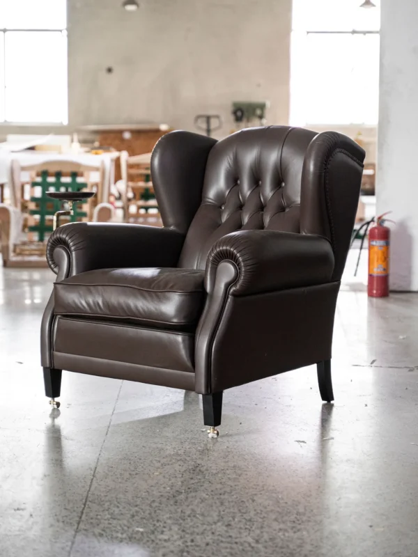 Cigar Wingback Armchair in clay — in a room setting