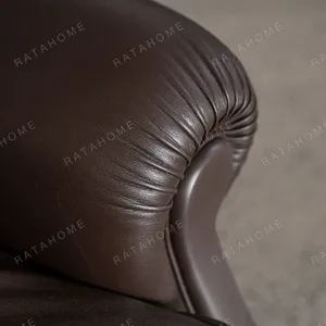Cigar Wingback Armchair in clay — detail