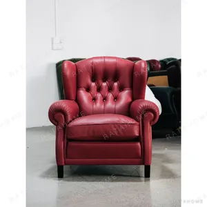 Cigar Wingback Armchair in Red Leather — in a room setting