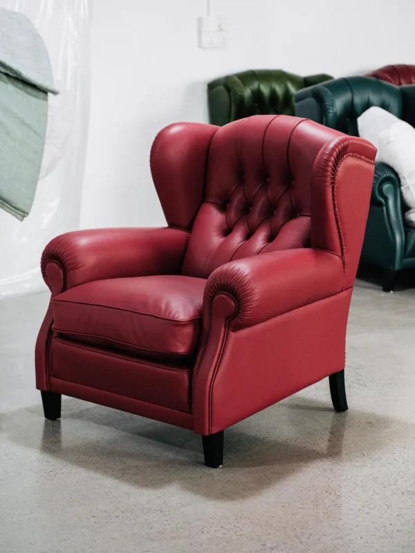 Cigar Wingback Armchair in Red Leather — in a room setting
