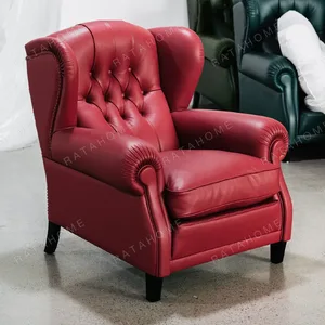 Cigar Wingback Armchair in Red Leather — in a room setting