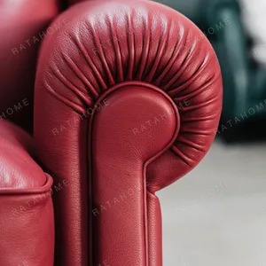 Cigar Wingback Armchair in Red Leather — detail