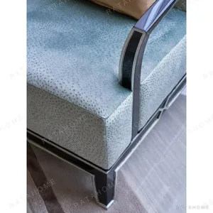 Adelyn Blue-Grey Velvet Armchair with Beech Arm Rails in blue — in a room setting