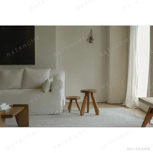 Alpine Teak Tripod Stool Set in Natural, Aged and Charred — in a room setting
