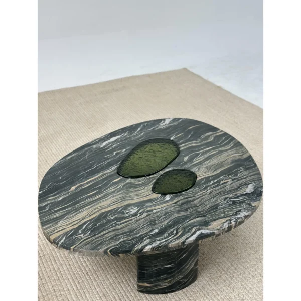 Green-Veined Marble Round Coffee Table with Inset Discs in olive — in a room setting