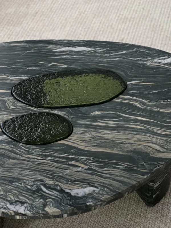 Green-Veined Marble Round Coffee Table with Inset Discs in olive — in a room setting