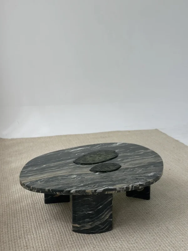 Green-Veined Marble Round Coffee Table with Inset Discs in olive — in a room setting