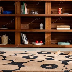Classic Poppy Flower Rug in Caramel and Black — in a room setting