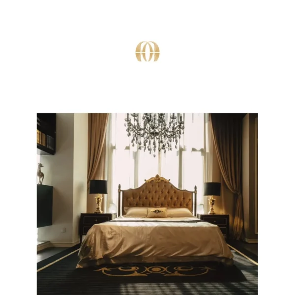 Carved Gilt Classical Bed in brushed brass — in a room setting