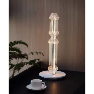 Clear Glass Bamboo Joint Table Lamp on Marble Base in silver — in a room setting