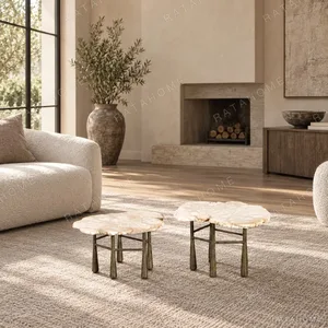 Raw-Edge Marble Nesting Side Table Pair in oatmeal — in a room setting