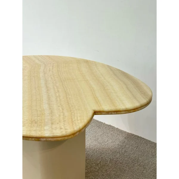 Cloud Petal-Edge Round Table in Champagne Stone — in a room setting
