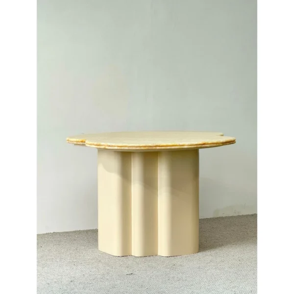 Cloud Petal-Edge Round Table in Champagne Stone — in a room setting