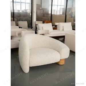 Cloud Toast Shearling Lounge Chair on Wood Block Base in oatmeal — in a room setting