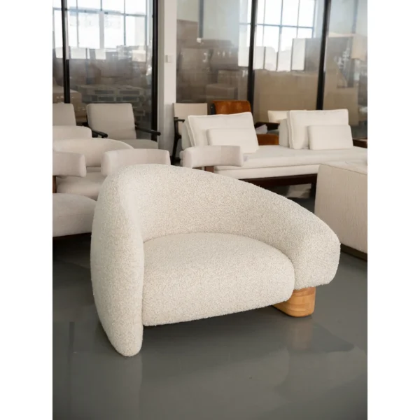 Cloud Toast Shearling Lounge Chair on Wood Block Base in oatmeal — in a room setting