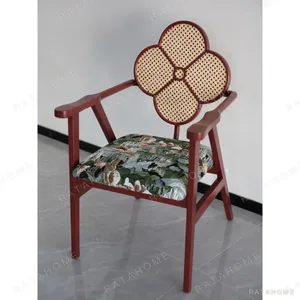 Clover Cane-Back Master Chair in burgundy — in a room setting