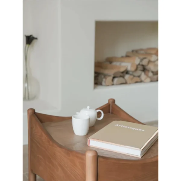Joker Ash Wood Stool with Removable Green Corduroy Cushion in walnut — in a room setting