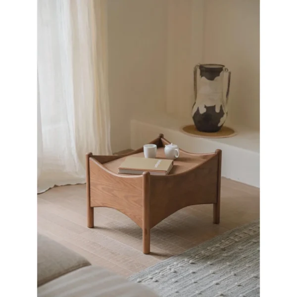Joker Ash Wood Stool with Removable Green Corduroy Cushion in walnut — in a room setting