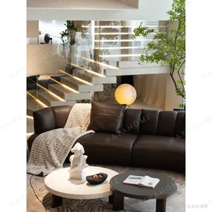 Coffee Bean Curved Leather Sofa in Deep Mocha, 356 cm — in a room setting