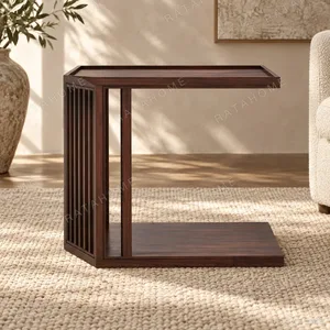 Walnut Slatted C-Shaped Sofa Side Table in walnut — in a room setting