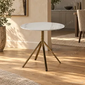 Round White Marble Side Table on Brass Tripod, 55 cm in ivory — in a room setting