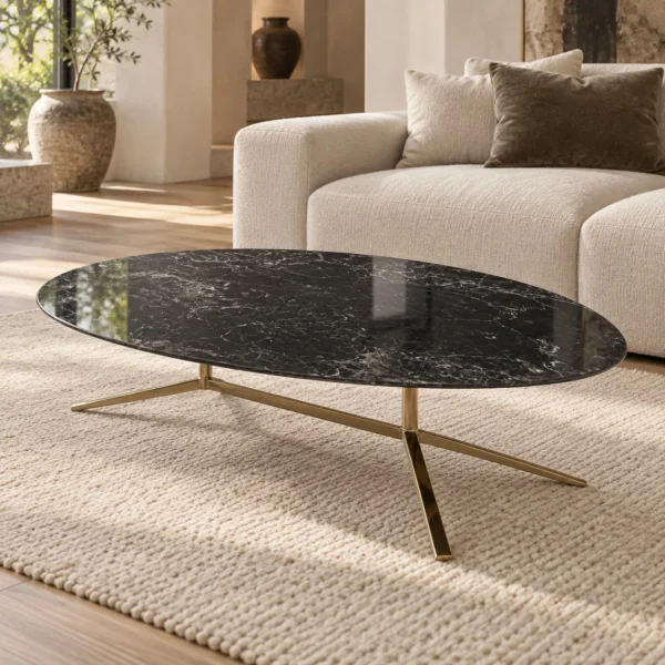 Oval Black Marble Coffee Table in black — in a room setting