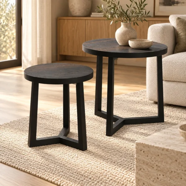Round Black Veneer Side Table Pair in black — in a room setting