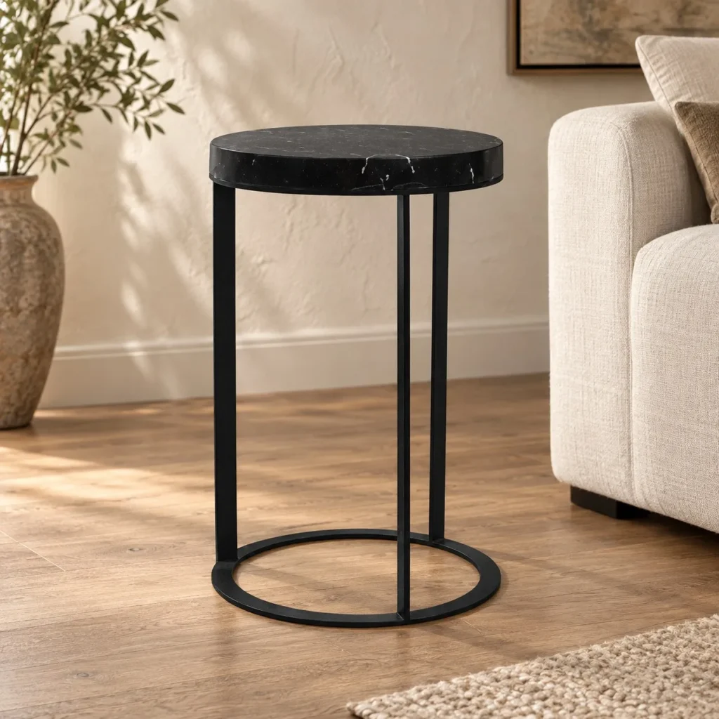 Round Black Marble Side Table on Black Metal Ring Base in black — front view