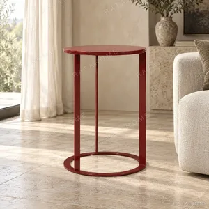 Round Red Lacquer Side Table on Red Metal Ring Base, 38 cm in red — in a room setting