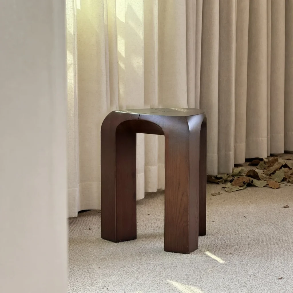Dark Wood Arched Stool Side Table in walnut — front view
