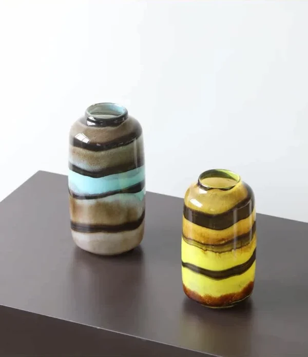 Colourful Banded Glass Vase in mustard — in a room setting