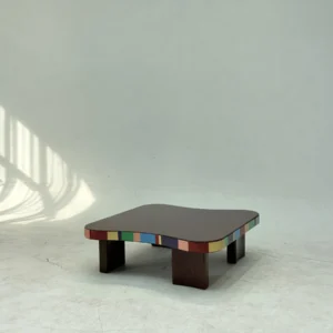 Colourful Striped Edge Mid-Century Coffee Table in black — front view