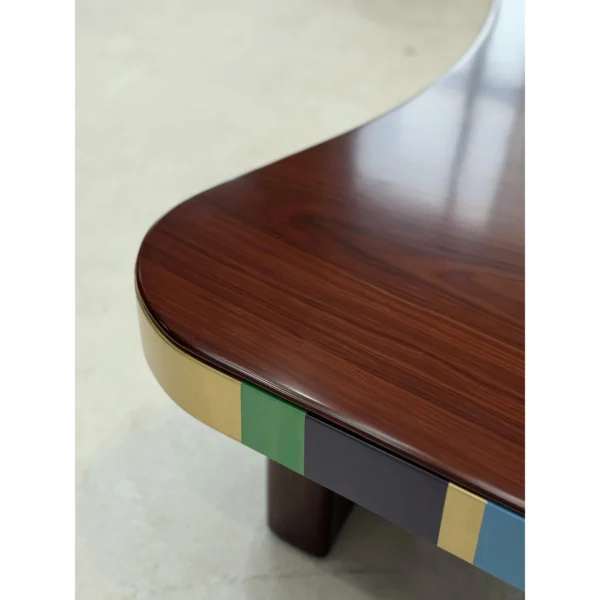 Colourful Striped Edge Mid-Century Coffee Table in black — in a room setting