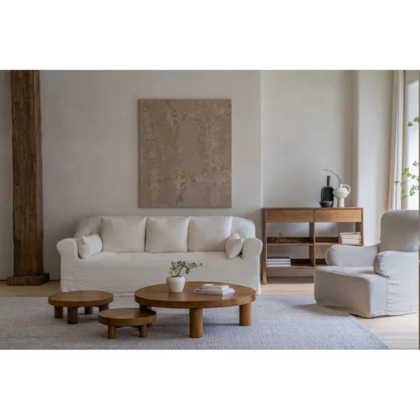 Teak Round Coffee Table Set of 3 on Cylinder Legs in natural oak — in a room setting