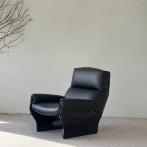 Matte Black Leather Study Lounge Chair with Metal Studs in black — front view