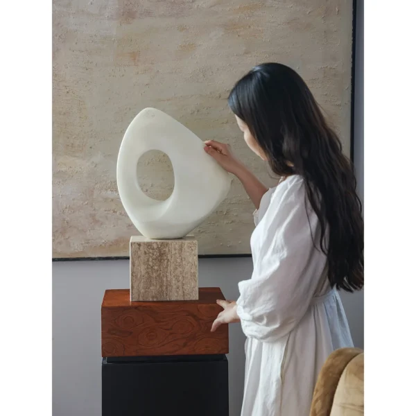 Jade-Effect Twisted Double-Arc Abstract Sculpture in ivory — in a room setting