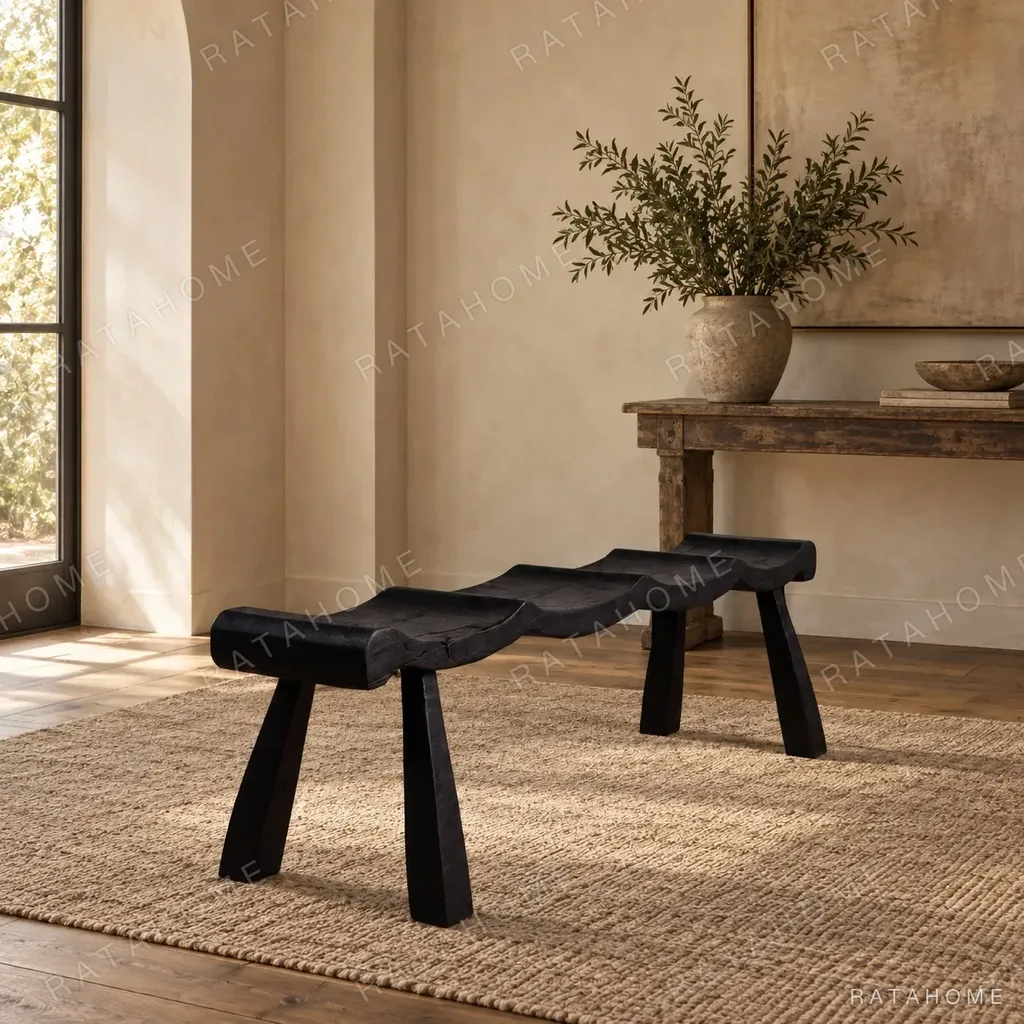 Contour Wave Bench in Charred Black Wood — in a room setting