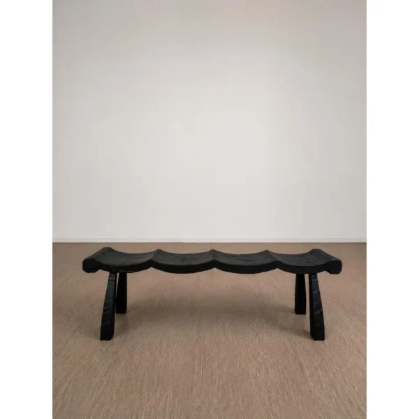 Contour Wave Bench in Charred Black Wood — in a room setting