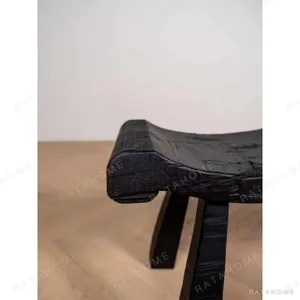 Contour Wave Bench in Charred Black Wood — in a room setting