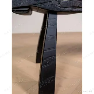 Contour Wave Bench in Charred Black Wood — in a room setting