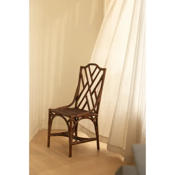 Dark Rattan Fretwork Side Chair in clay — in a room setting
