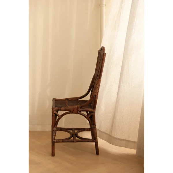 Dark Rattan Fretwork Side Chair in clay — in a room setting