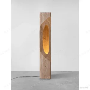 Roman Travertine Illuminated Totem Floor Sculpture in sand — in a room setting