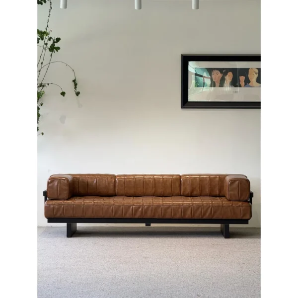 Cognac Leather Modernist Daybed Sofa on Ash Frame, 240 cm in clay — in a room setting