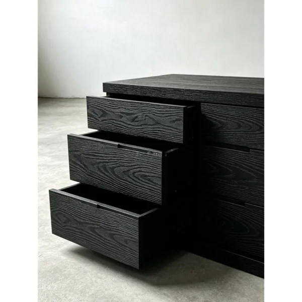 Black Oak Stepped Cabinet with Drawers, 115 cm in black — in a room setting