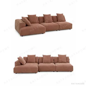 Low Corduroy Sofa in Terracotta with Rounded Block Arms — in a room setting