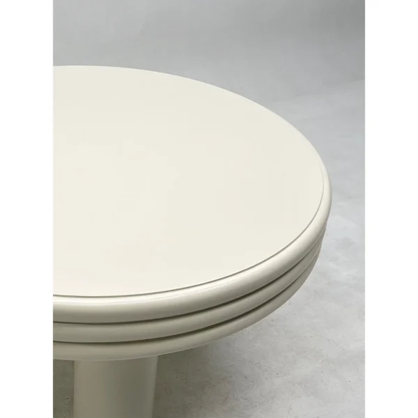 Cream Stacked-Edge Round Table on Column Legs in oatmeal — in a room setting