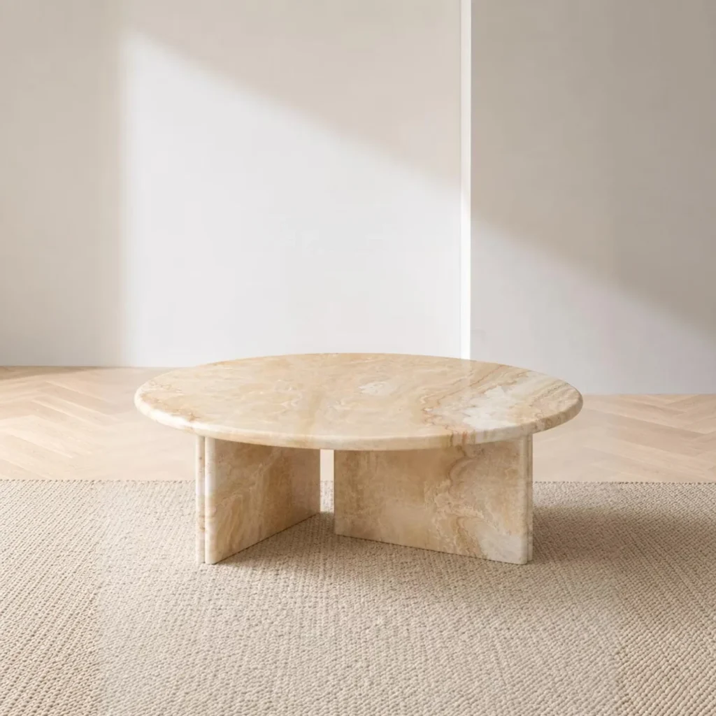 Cream Onyx Round Coffee Table on Cross Stone Base in oatmeal — front view
