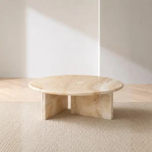 Cream Onyx Round Coffee Table on Cross Stone Base in oatmeal — front view