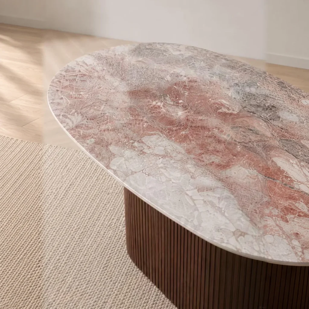 Pink-Grey Marble Oval Dining Table on Fluted Dark Wood Base in rose stone — front view